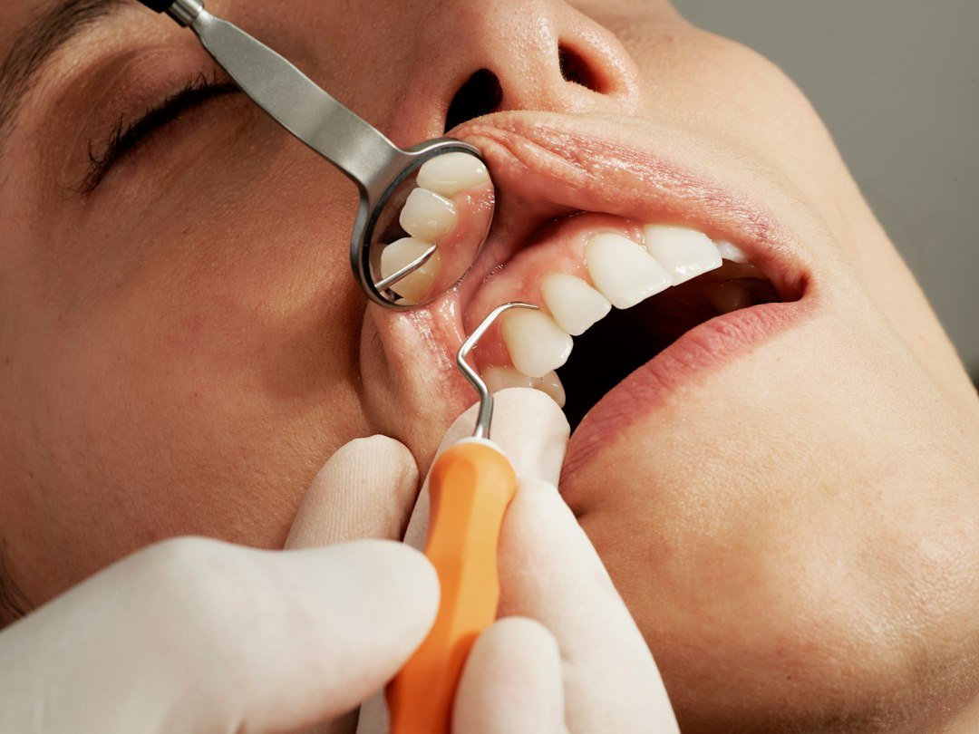 Dentist examining a patient during dental treatment